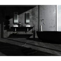 Minimalistisk badeværelse i sort hvid med stort sort badekar og en vandhane i rustfrit stål og en sort vask på en grå væg i baggrunden